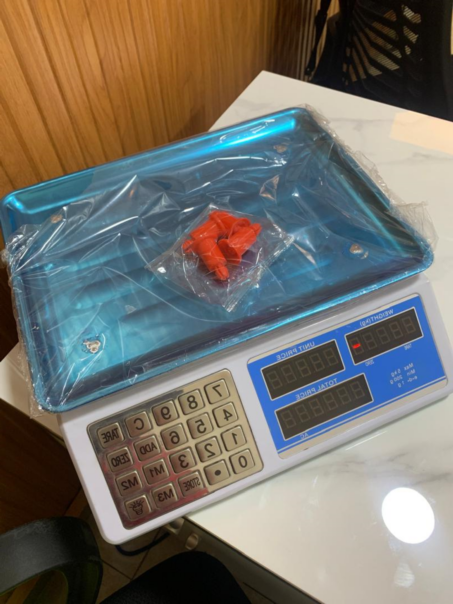 What is the price of Digital computing scale blue box in Uganda