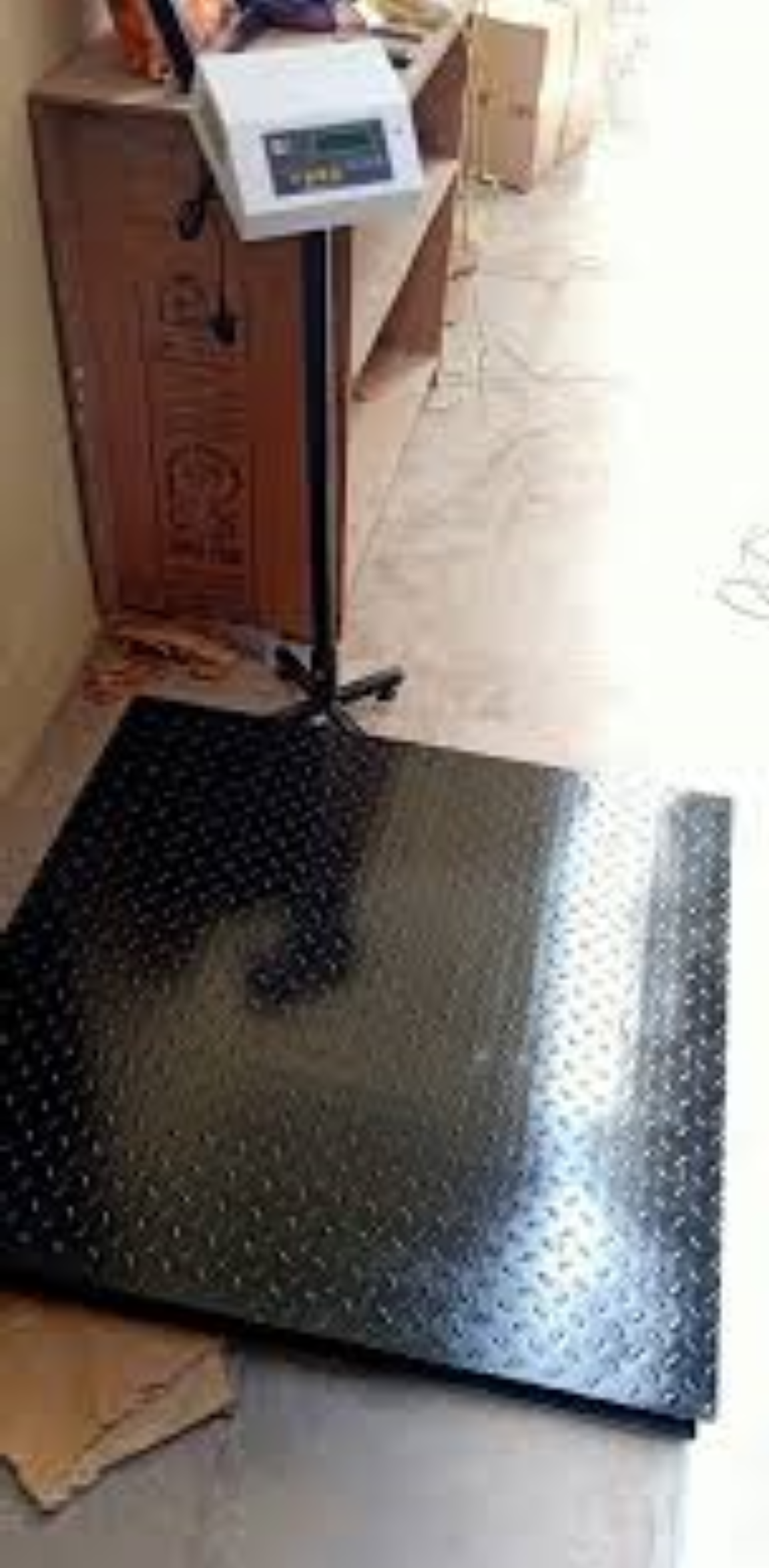 What is the cost of 2Ton Floor weighing scales in Kampala Uganda