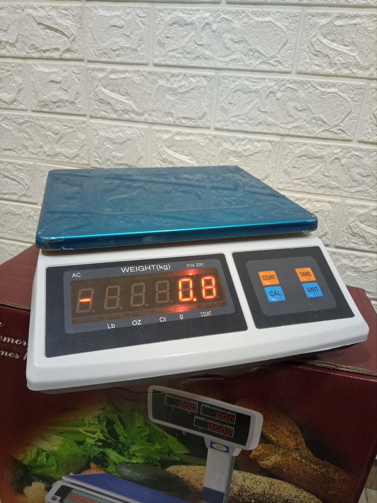 What are the prices of Digital price computing weighing scale 50kg blue in Kampala