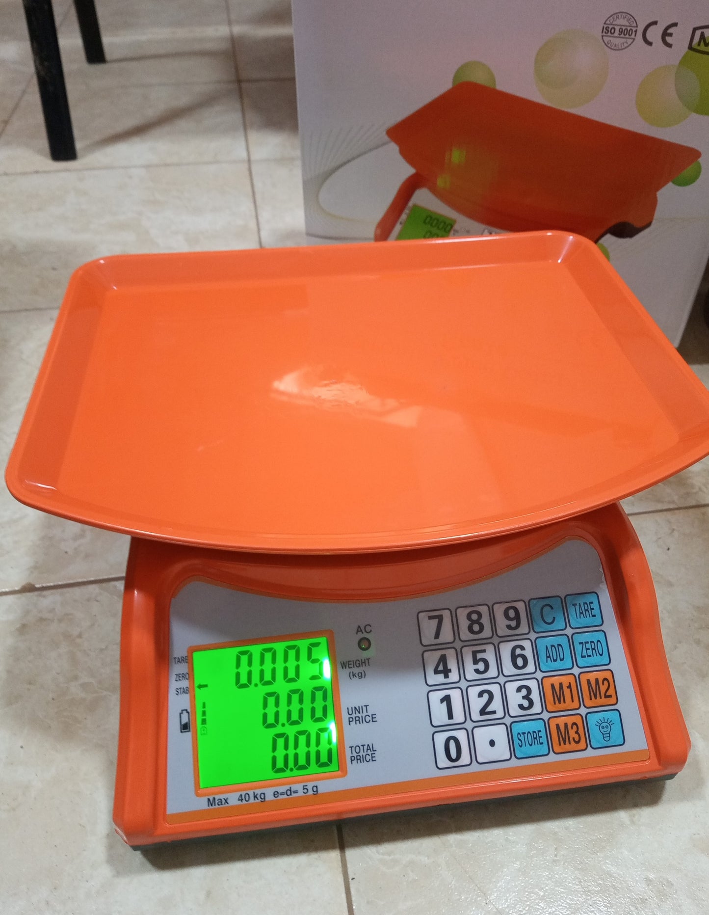 How much are Electronic Price computing weighing scale orange in Uganda
