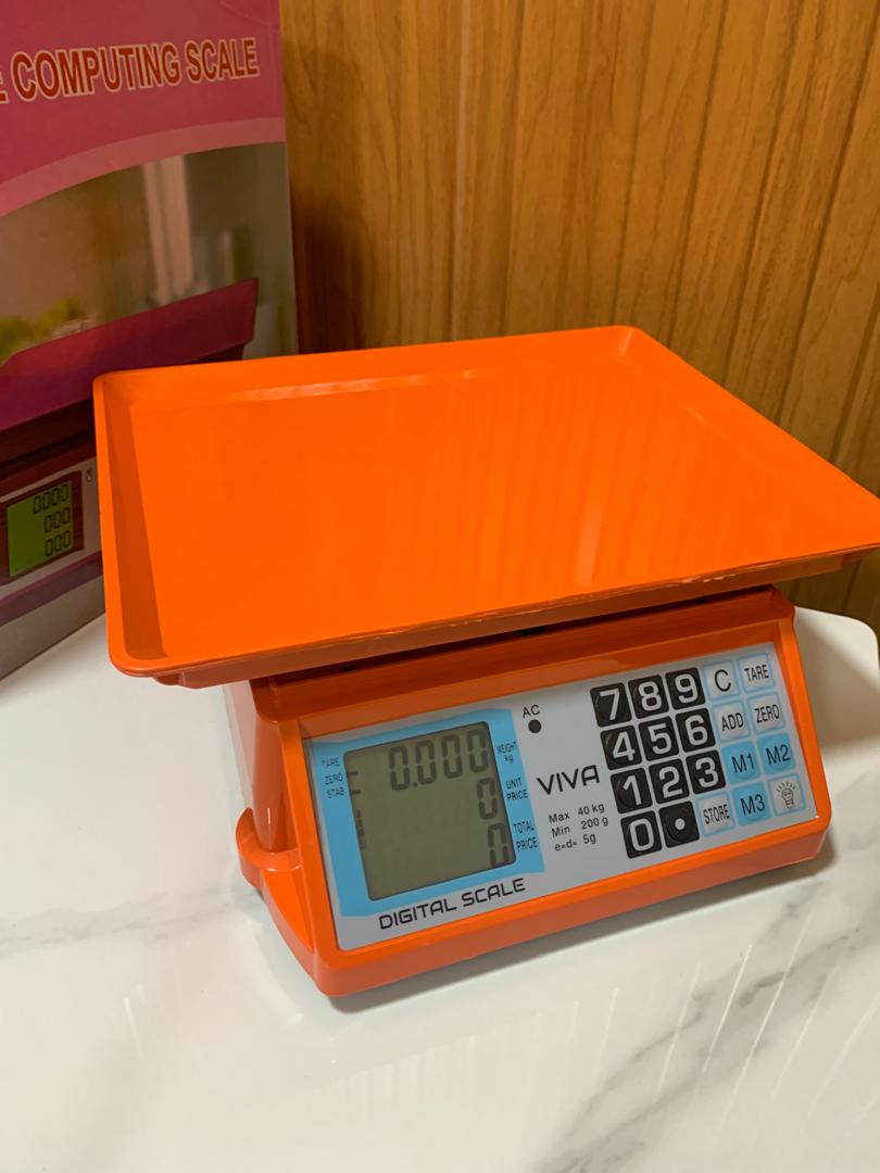 Electronic Price computing weighing scale orange Company in Uganda