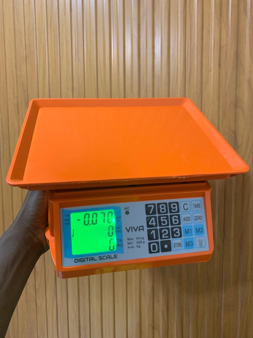 How much is an Electronic Price computing weighing scale orange in Kampala Uganda