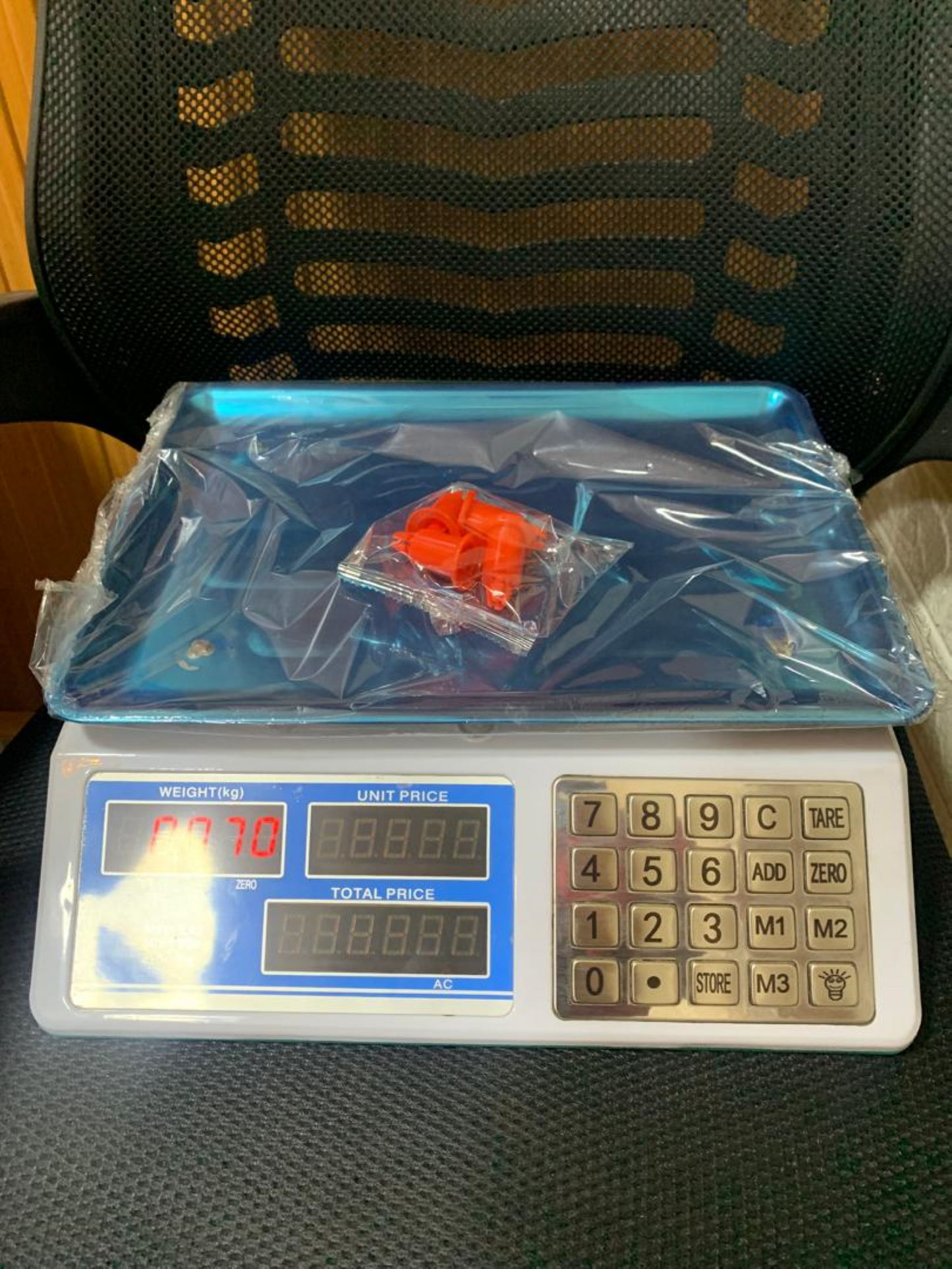 How much are Digital price computing weighing scale blue box in Kampala