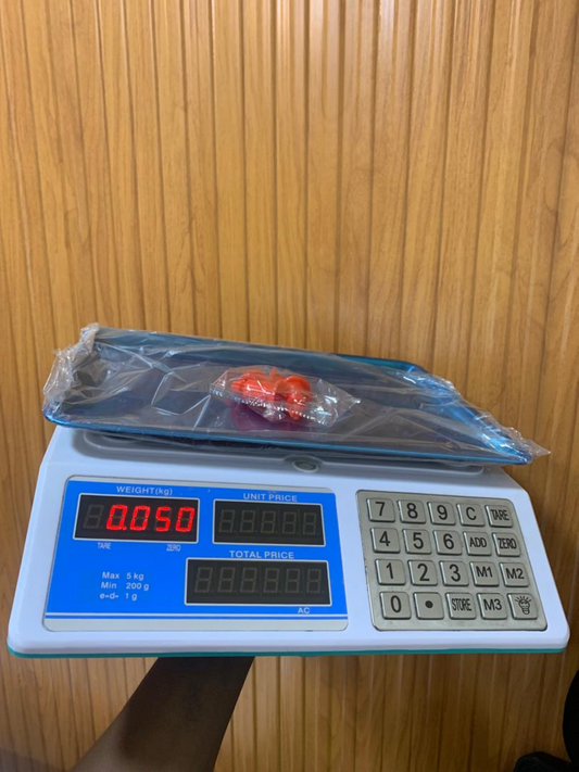 What is the cost of a DT-580 Mini Electronic Computing scale in Kampala