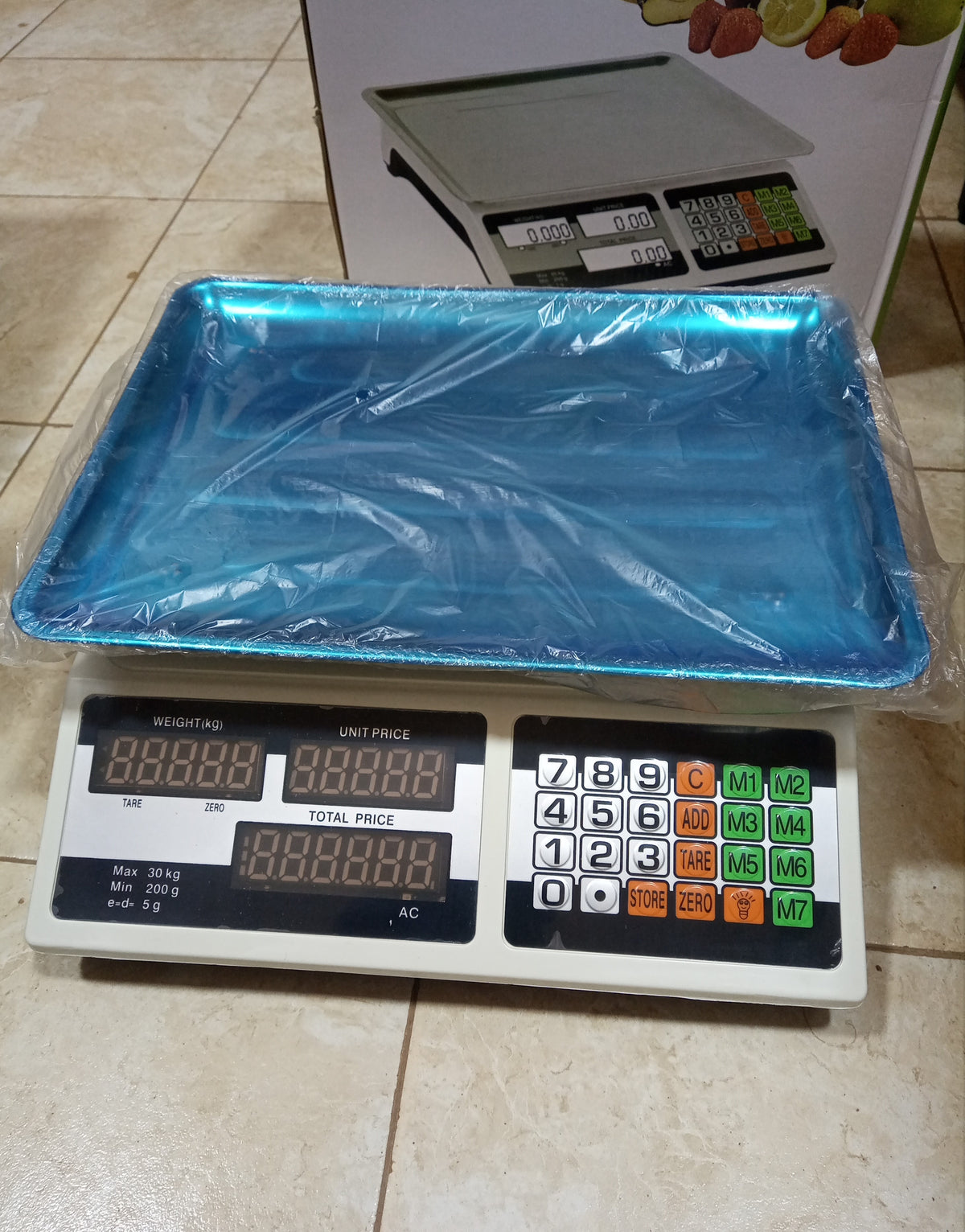 What is the price of Electronic computing price scale ACS blue in Kampala