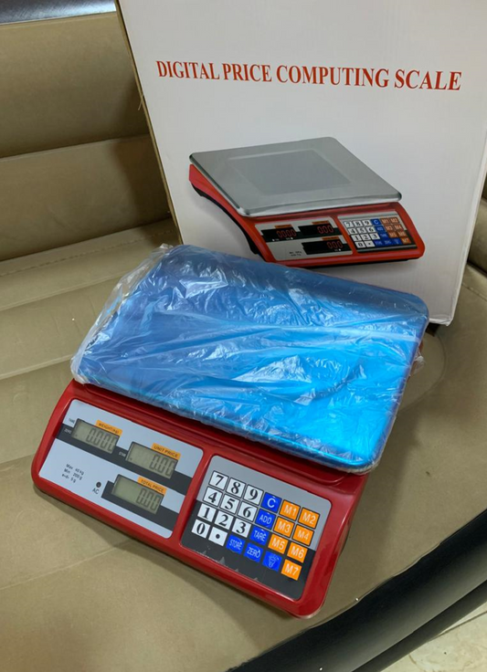 Digital price computing weighing scale red shop in Kampala