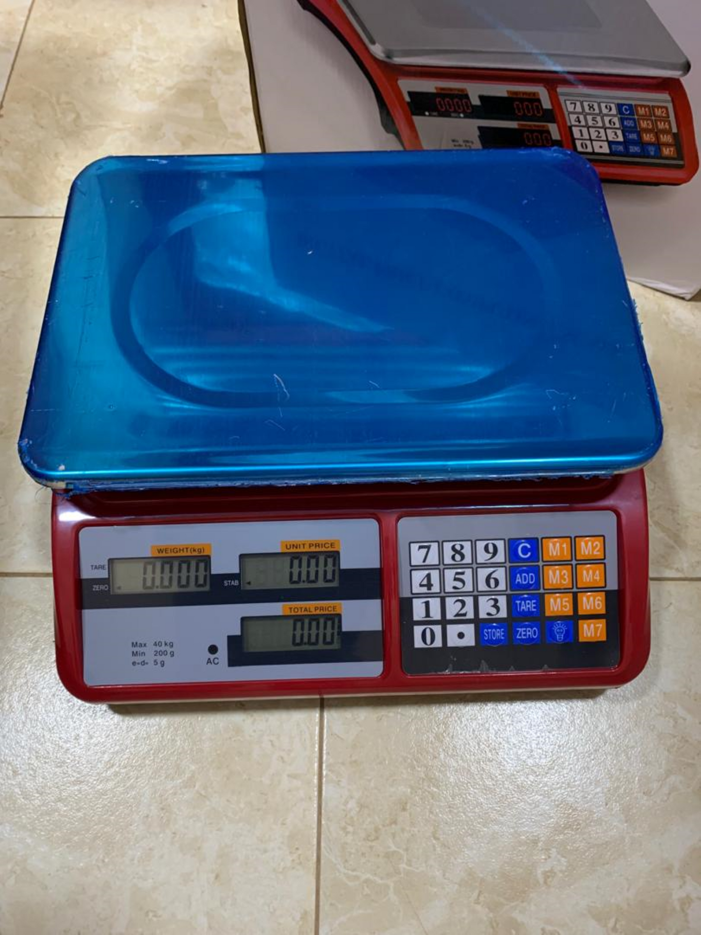 What is the cost of a DT-580 Mini Electronic Computing scale in Uganda