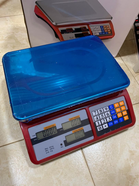 How much are Digital price computing weighing scale red in Kampala