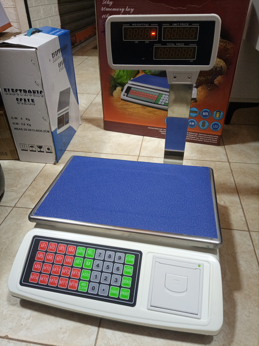 How much is Digital price computing weighing scale 50kg blue in Kampala