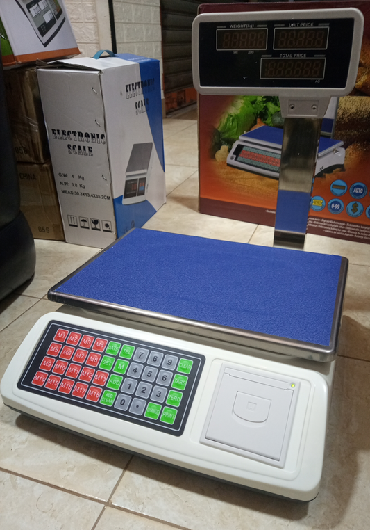 How much is Digital price computing weighing scale 50kg blue in Uganda