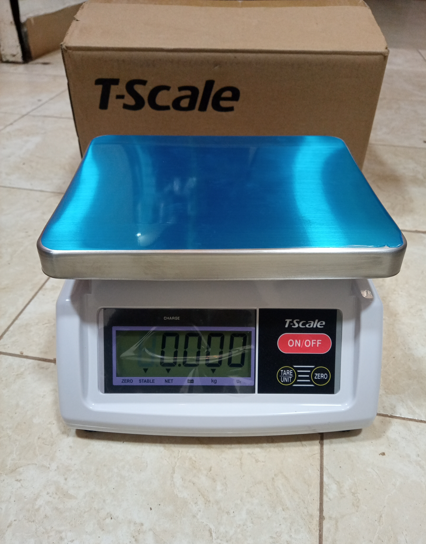 Digital price computing weighing scale blue box store in Kampala Uganda