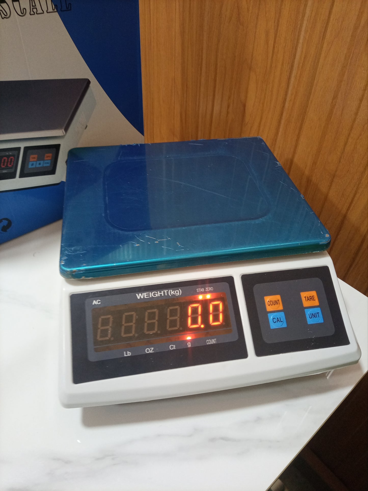 What are the prices of Digital price computing weighing scale blue box in Kampala