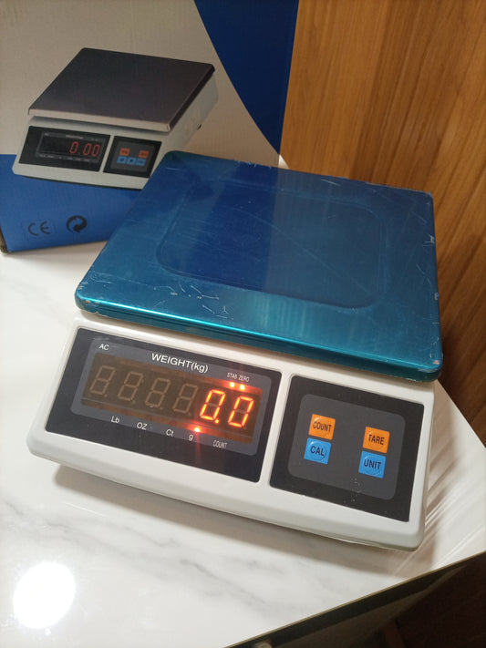Electronic computing price weighing scale ACS blue store in Kampala
