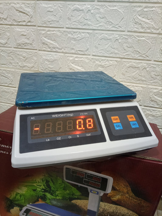 What are the prices of Digital price computing weighing scale 50kg blue in Kampala