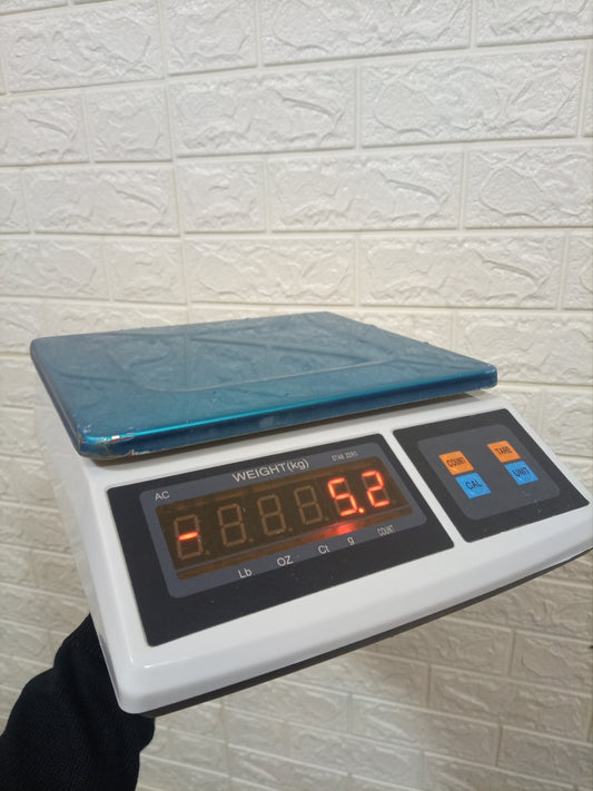 What are the prices of Electronic computing price weighing scale ACS blue in Uganda
