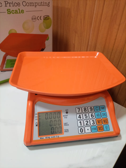 Electronic Price computing weighing scale orange store in Kampala Uganda