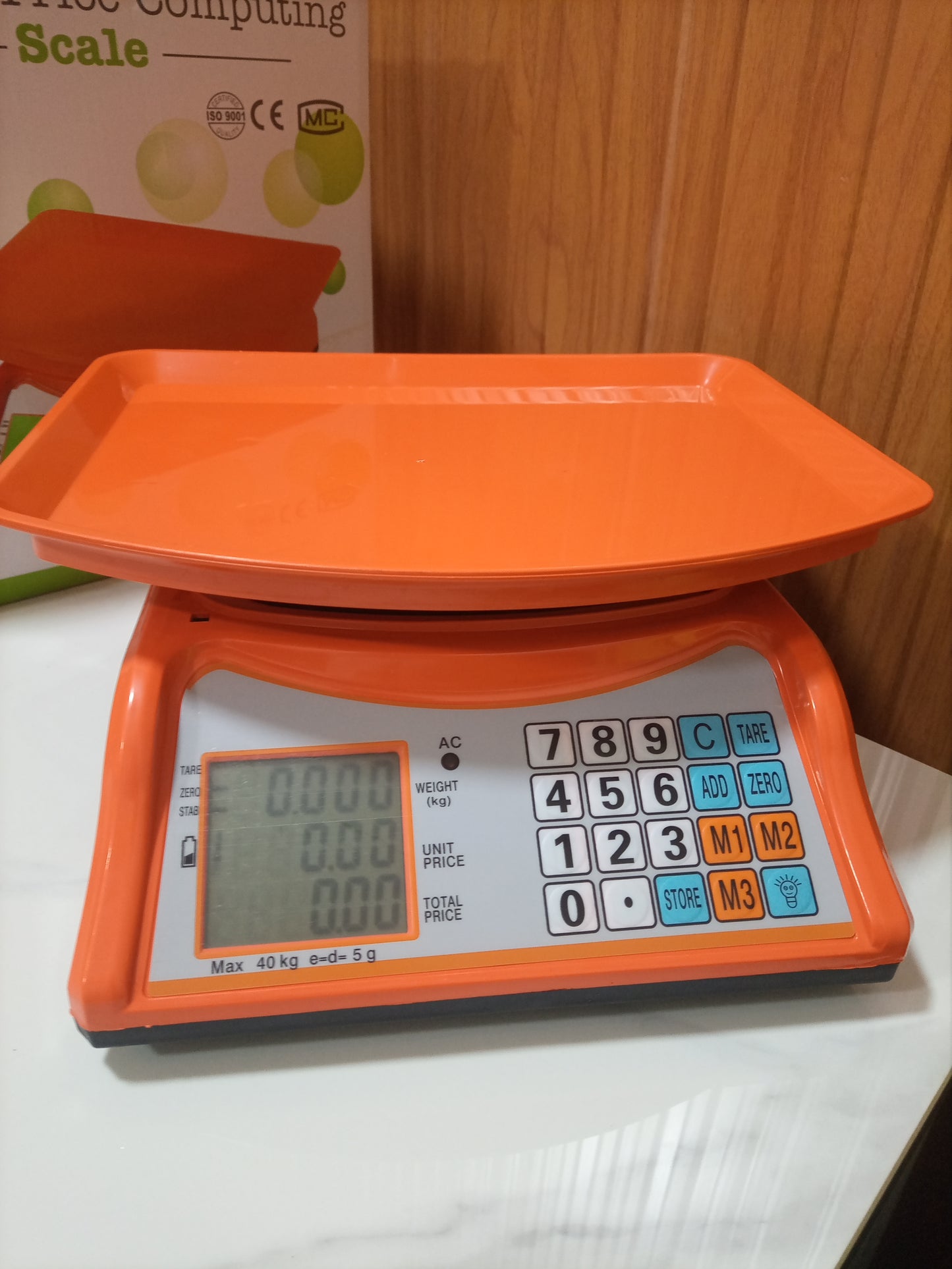Where to buy an Electronic Price computing weighing scale orange in Kampala