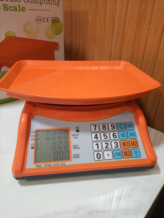 Where to buy an Electronic Price computing weighing scale orange in Kampala