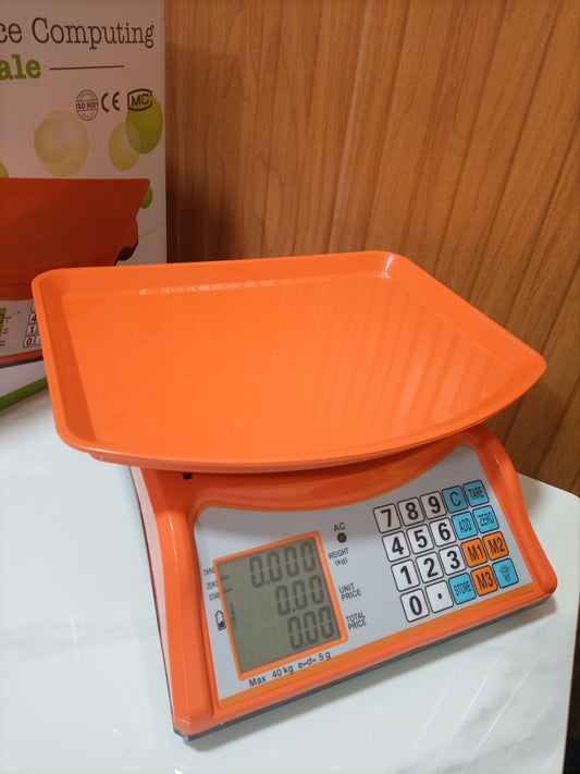 Where can I buy an Electronic Price computing weighing scale orange in Uganda