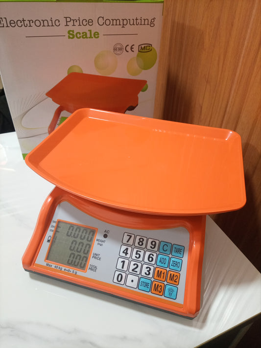 Supplier of an Electronic Price computing weighing scale orange in Kampala Uganda