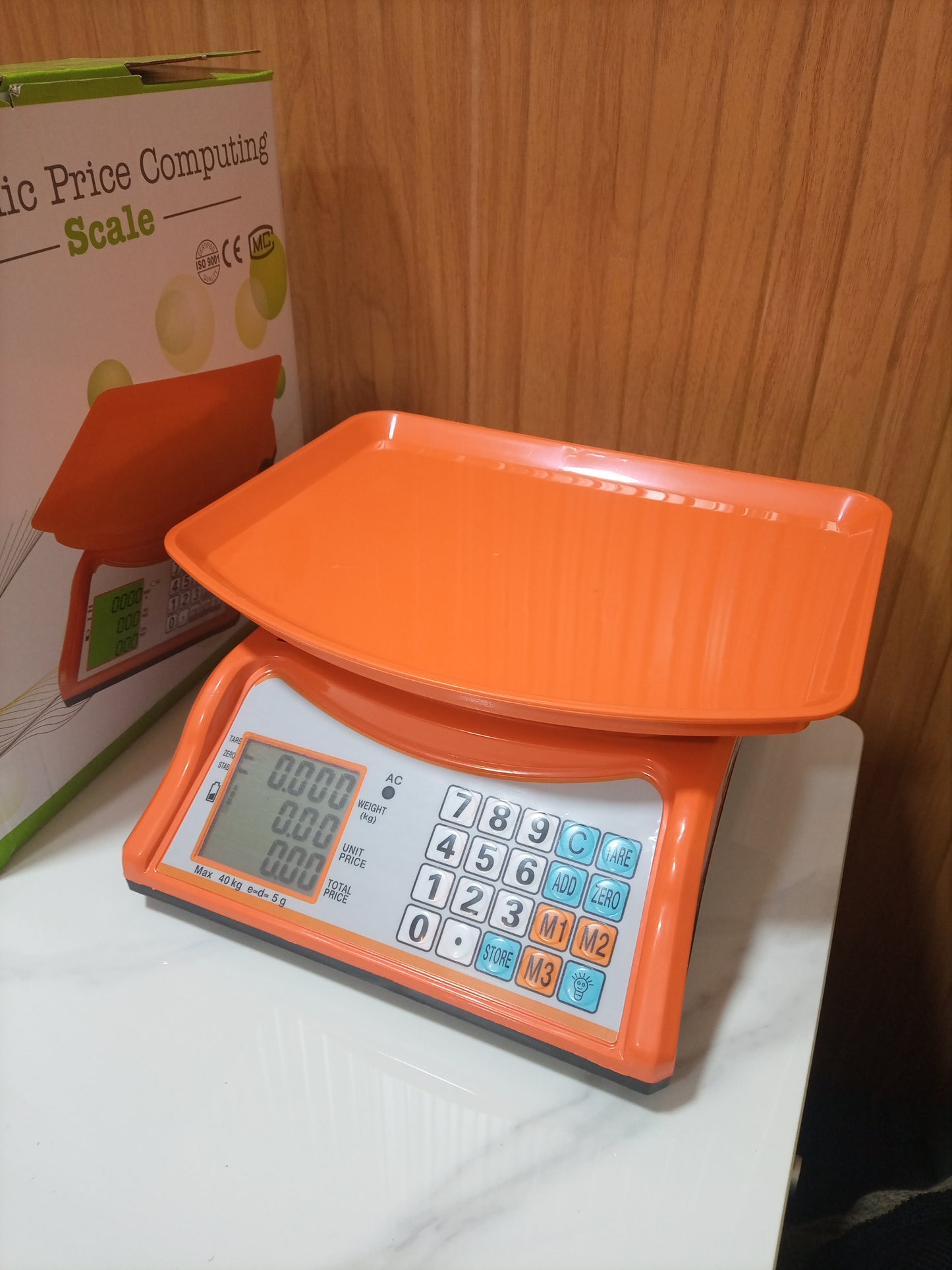 Where can I buy an Electronic Price computing weighing scale orange in Kampala