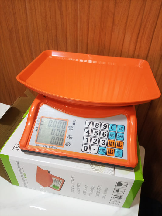 What is the cost of an Electronic Price computing weighing scale orange in Kampala