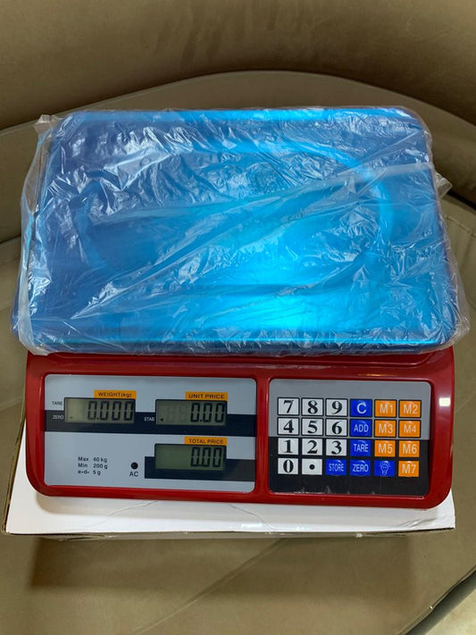 Cost of Digital price computing weighing scale red in Uganda