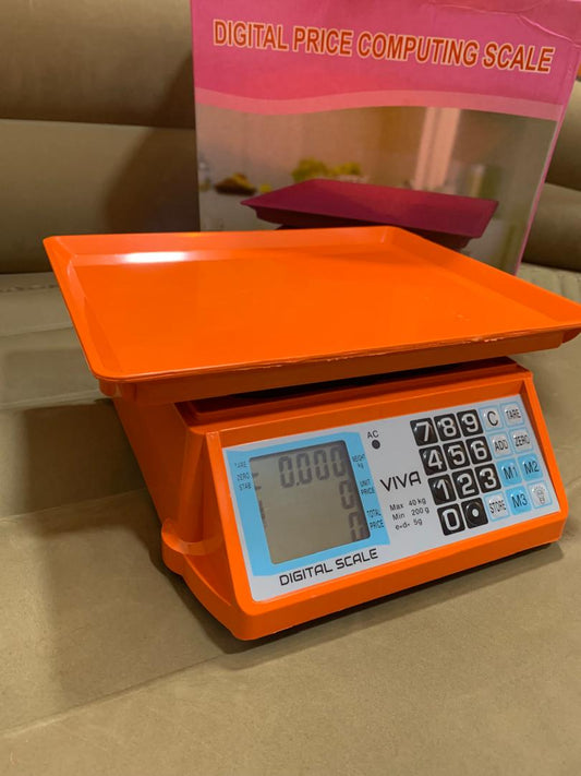 Electronic Price computing weighing scale orange shop in Uganda