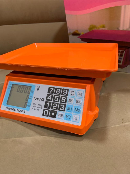 Cost of an Electronic Price computing weighing scale orange in Uganda