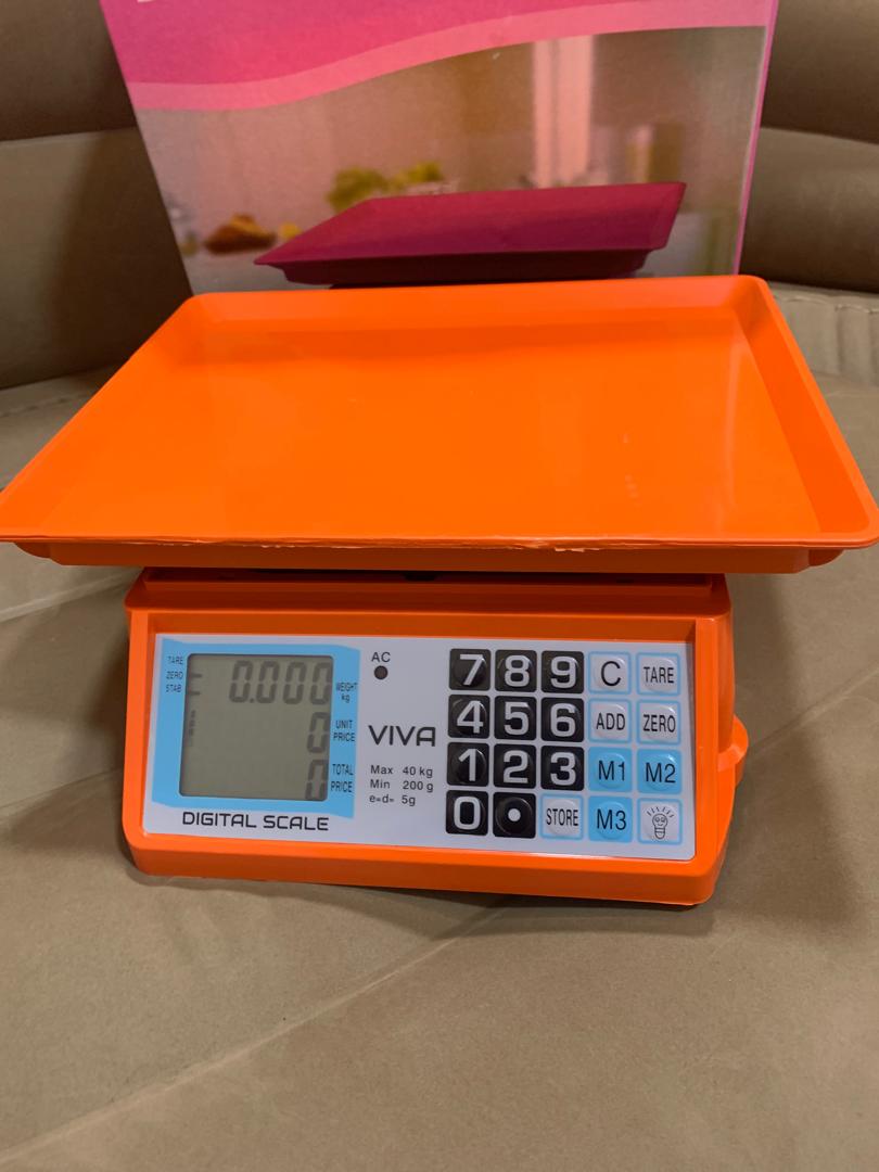 Cost of an Electronic Price computing weighing scale orange in Kampala Uganda