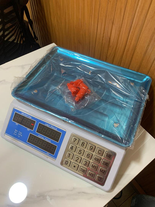 What is the cost of Electronic computing price weighing scale ACS blue in Uganda