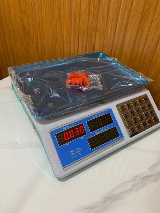 What are the prices of Electronic computing price weighing scale ACS blue in Kampala