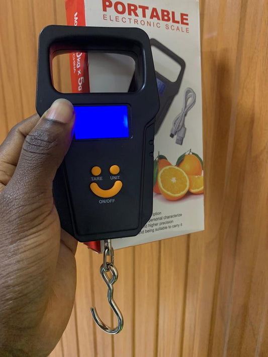 What is the price of Portable Electronic Weighing Scale Red Box in Kampala