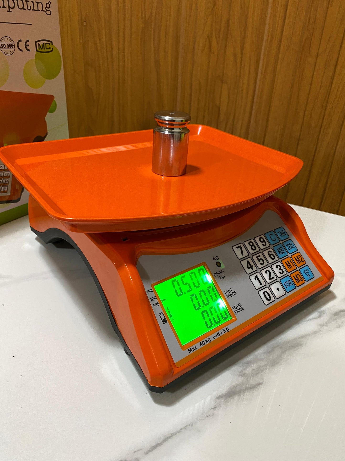 Electronic Price computing weighing scale orange shop in Kampala