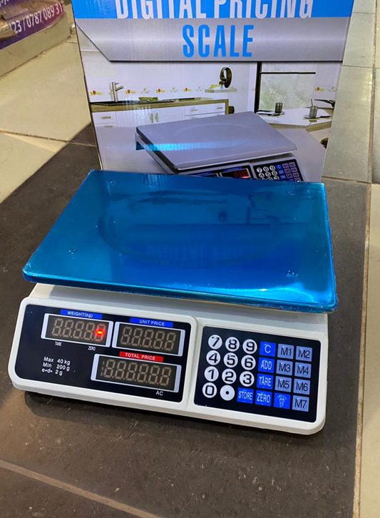 What are the prices of a DT-580 Mini Electronic Computing scales in Kampala